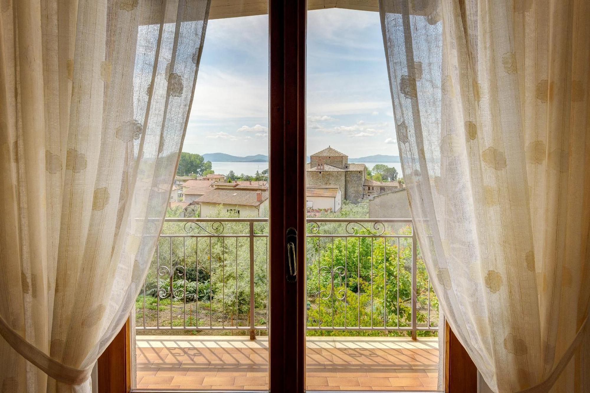 Appartamento Luisa - Vista Lago Passignano sul Trasimeno Buitenkant foto